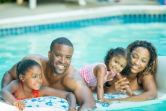 Family having fun in their pool.