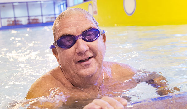 Adult Swimming in Pool