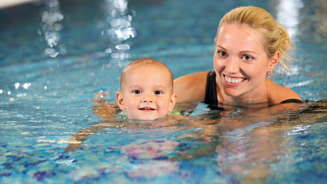 Mum and baby in swimming pool
